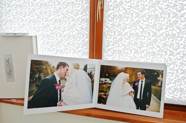 Pages with photo of wedding book and album