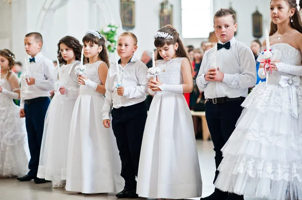 LVIV, UKRAINE - MAY 8, 2016: The ceremony of a First Communion i