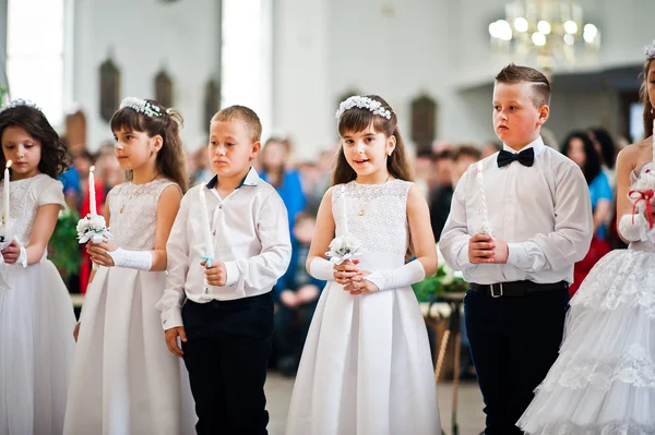 LVIV, UKRAINE - MAY 8, 2016: The ceremony of a First Communion i