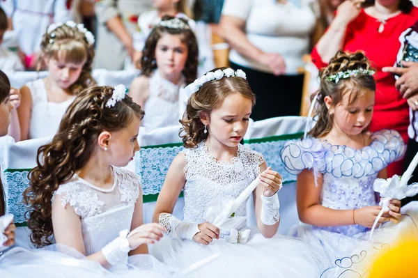 Mukyluntsi , Ukraine - 26 june, 2016: First holy communion.