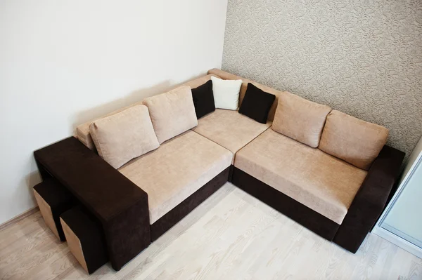 Bicolor cofee corner sofa bed at light room