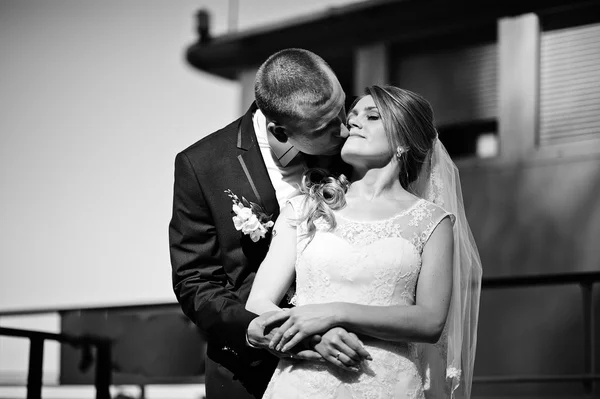 Wedding couple on small boat ship