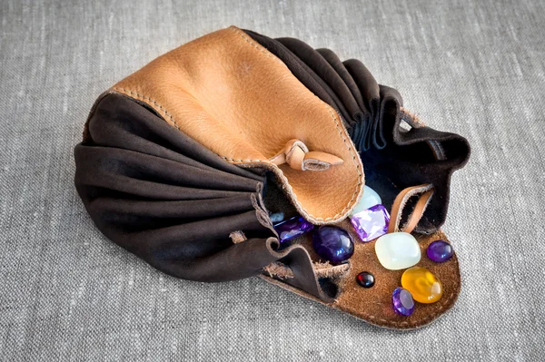 Leather purse with semi-precious stones.