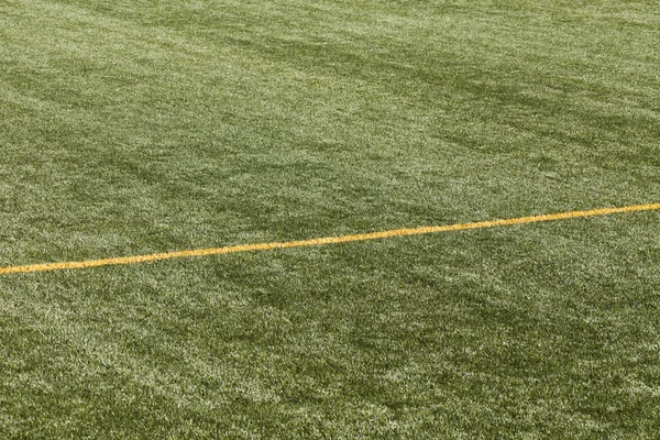 Football pitch with yellow lines