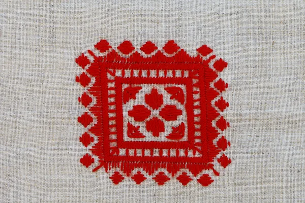 Red crosses embroidered pattern in national style