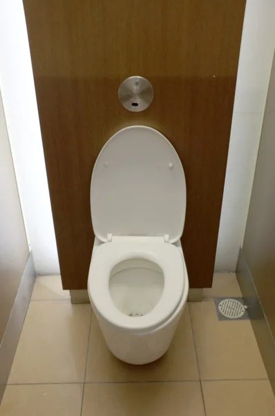 White toilet bowl in modern public rest room