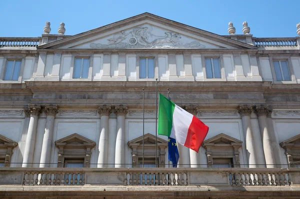 Scala theater & italian flag in Milan Italy