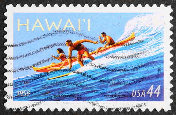 Stamp representing surfer & canoe in Hawaii islands