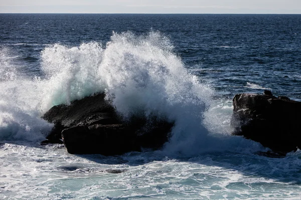 Waves Crash on Rugged California Coastline
