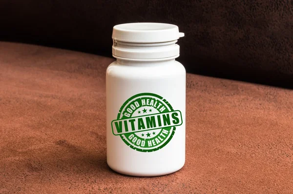 Bottle of pills with vitamins