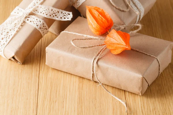 Paper wrapped gift box with fall theme