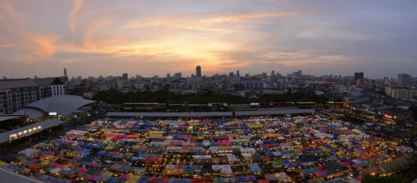 Bangkok skyline with night market city before sunset Bangkok, Thailand.