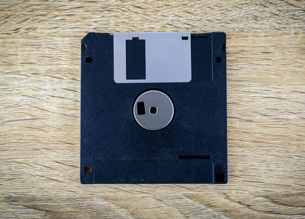 Floppy Disk magnetic  on a wooden table