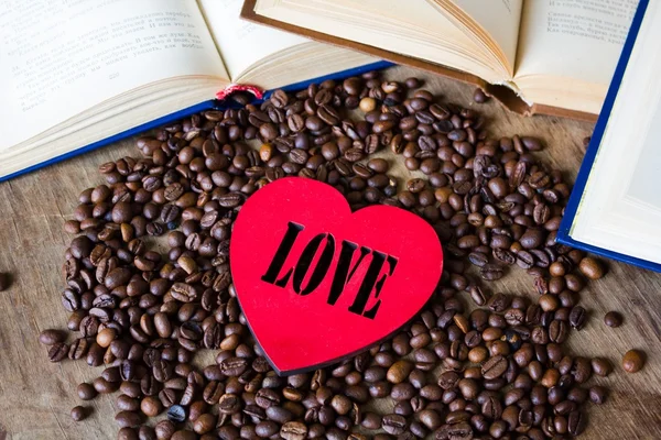 Coffee beans and book with heart on it