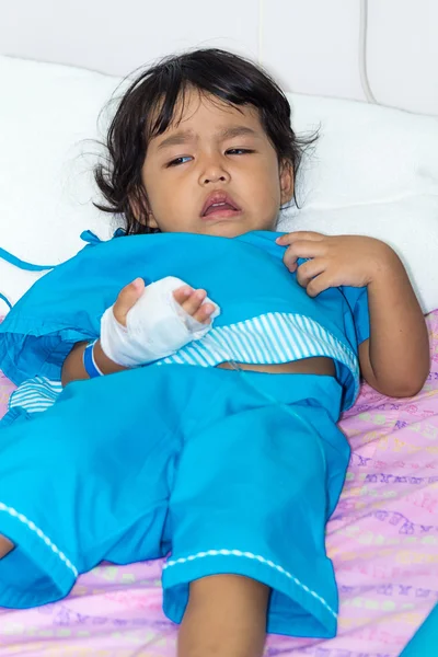 Illness asian kids crying, asleep on a sickbed in hospital, sali