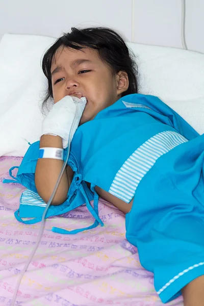 Illness asian kids crying, asleep on a sickbed in hospital, sali