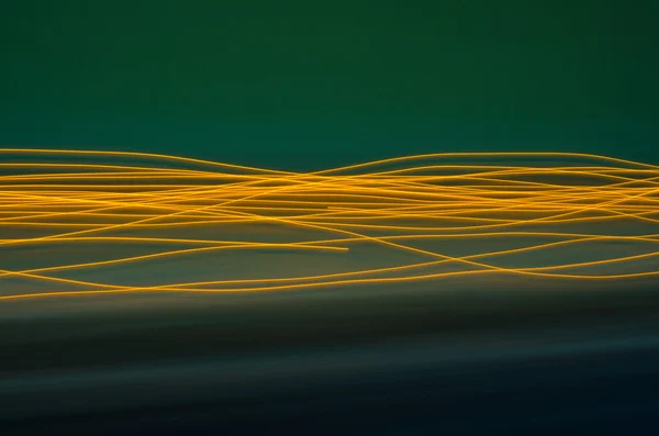 Green abstract background. Lines and curves concept of speed.