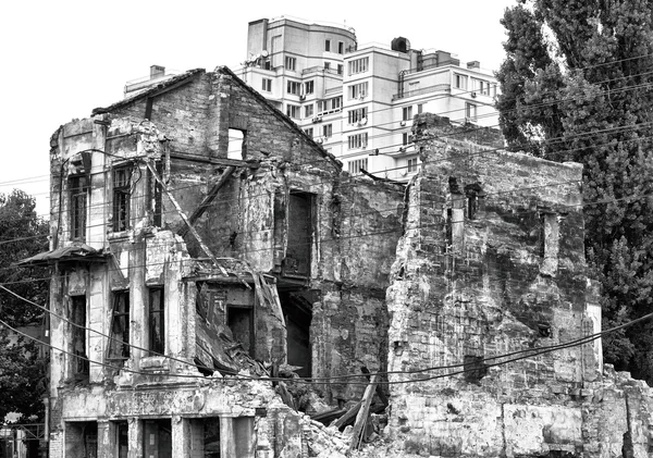 Old ruined house in city after bombing black and white HDR effect