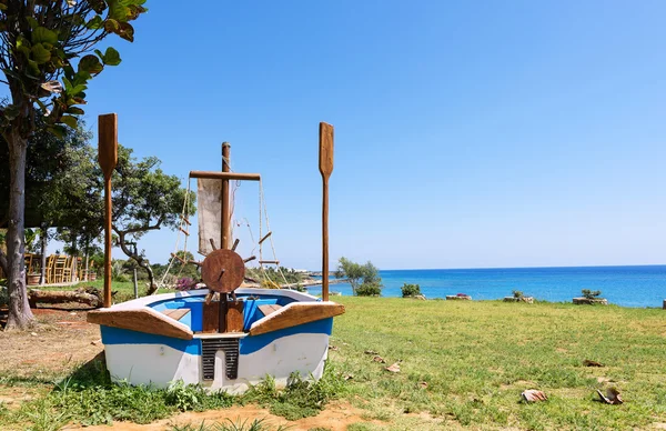 Photo of a sailor boat on a beach in protaras, Cyprus island.