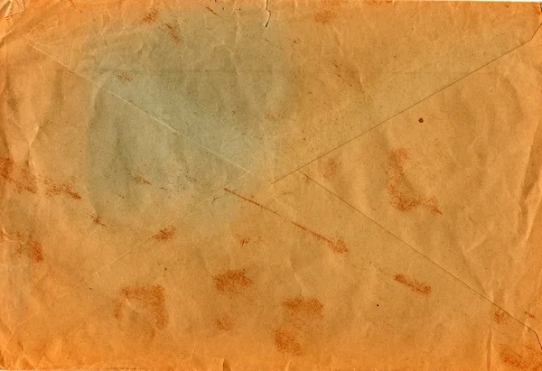 Back of an old used envelope. Rich stain and paper details. Can be used as background.