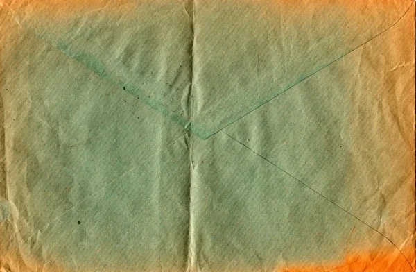 Back of an old used envelope. Rich stain and paper details. Can be used as background.