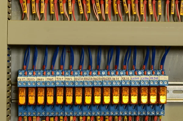 Close up wiring connectors (terminal blocks), multi color wire cables with caption fields.