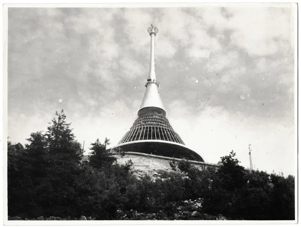 Retro photo shows view on Jested. Jested mount and broadcaster near Liberec, Ore mountains, Czech Republic. Black & white vintage photography