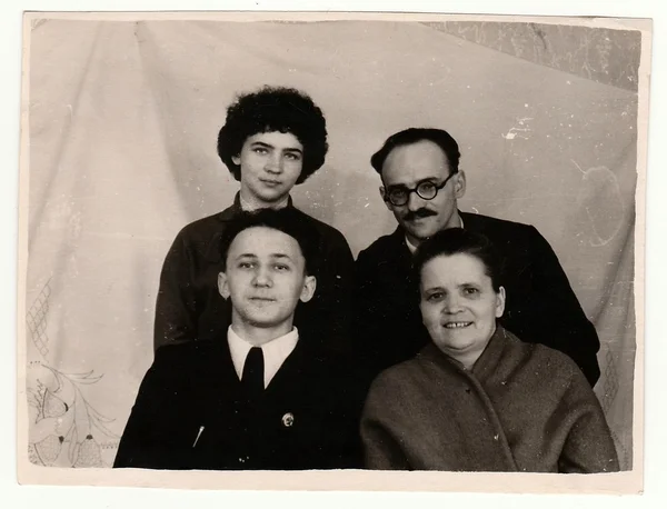 Vintage photo of family. Parents and their children.