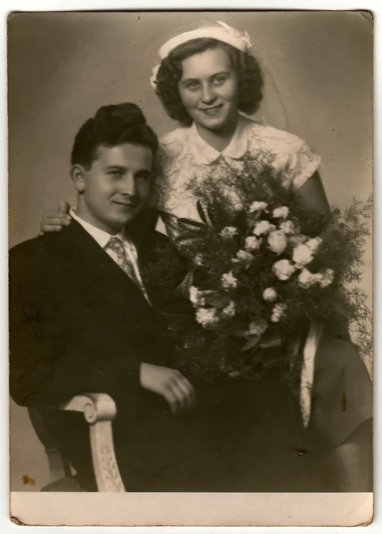 Vintage photo of newlyweds.  An antique Black & White photo