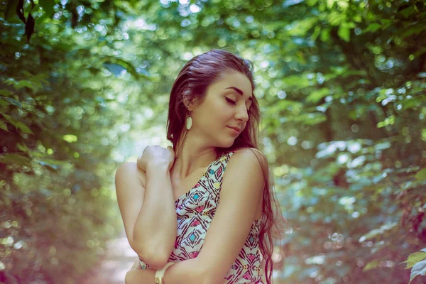 Beautiful long hair brunette on the plein air