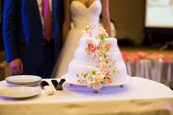 Beautiful wedding cake with white flowers