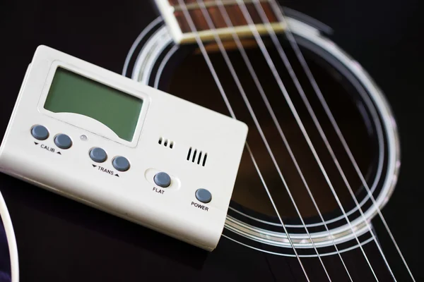 Guitar and tuner for musical instruments