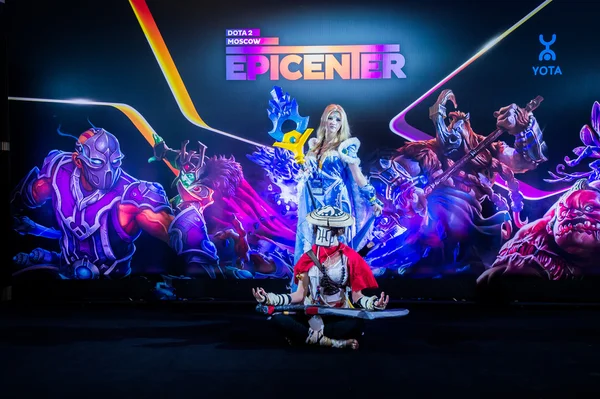 EPICENTER MOSCOW Dota 2 cybersport event may 13. Cosplay of game heroes crystal maiden and juggernaut at the event background