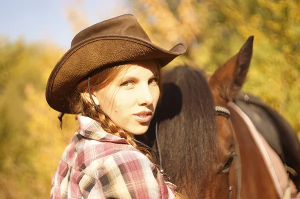 Cowgirl and a horse