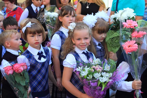 Girls first graders on a solemn ruler on September 1