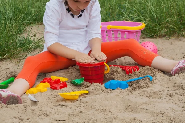Fun at the beach with colorful toys
