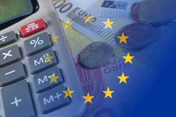 Euro banknotes, coins, calculator, eu flag