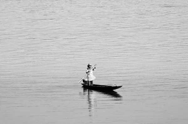 Man in boat on river