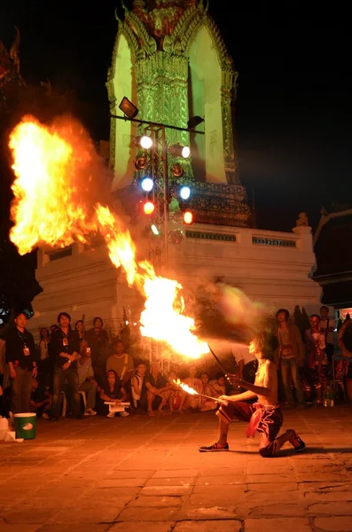 Street entertainers breathing fire