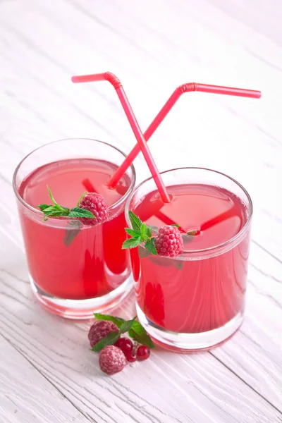 Refreshing raspberry drink with mint