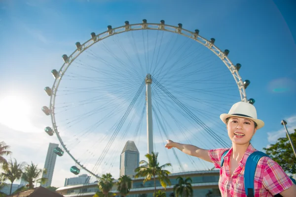Happy Asia woman Travel in Singapore, Singapore Flyer