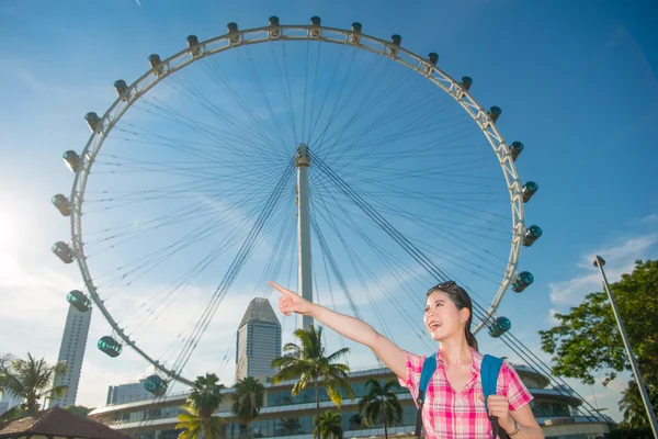 Happy Asia woman Travel in Singapore, Singapore Flyer