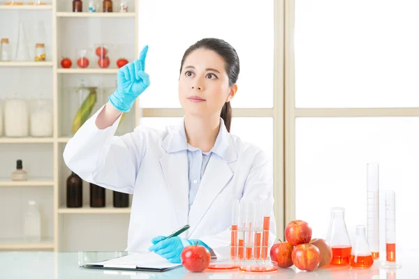 Asian female scientist drop the cure for genetic modification