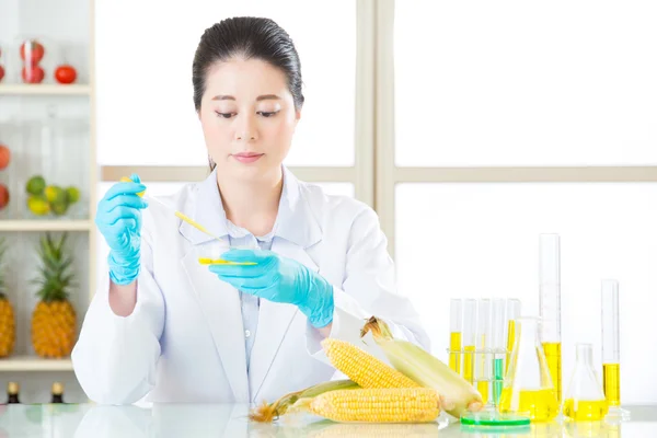 Asian female scientist working on plant biology