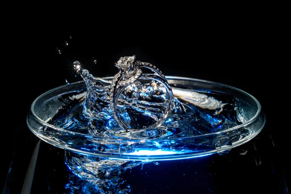 Wedding Rings Sinking in a cup of Water