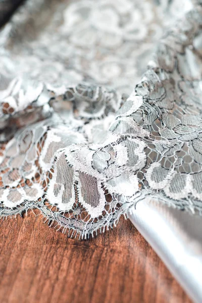 Beautiful lace with floral ornament on white background