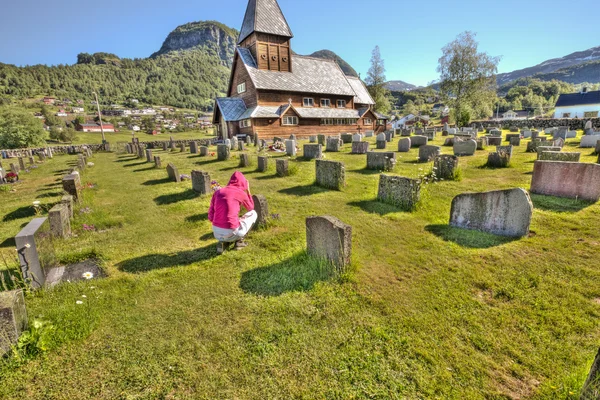 Praying at graveside