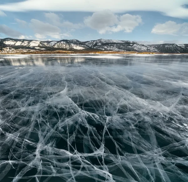 Ice lake with cracks.