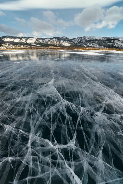 Ice lake with cracks.
