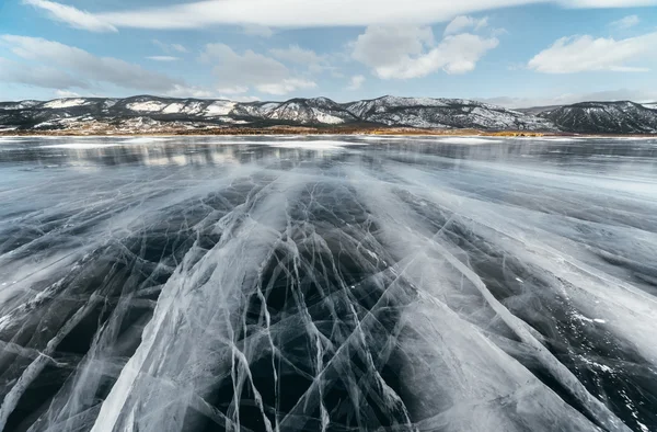 Ice lake with cracks.